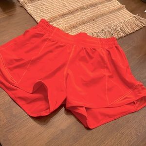 Lululemon size 4 Tall (4” inseam) - carnation red - Hotty hot shorts